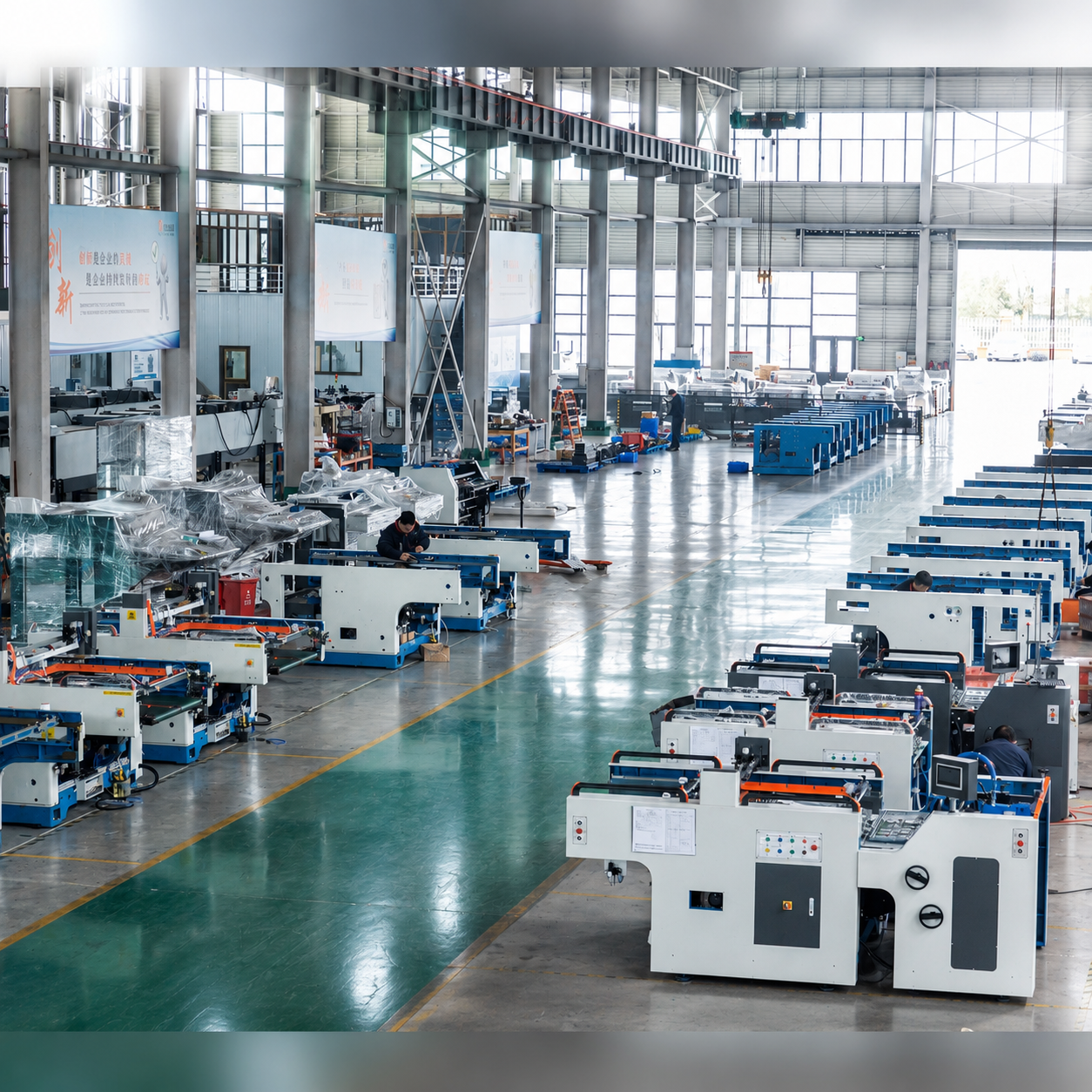 SAGLIN Machinery assembly hall — modular cells for cardboard lamination, window patching, and cold foil stamping equipment